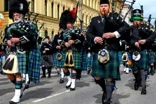 Bagpipe player in a traditional kilt at the St. Patrick's Day Parade in Munich